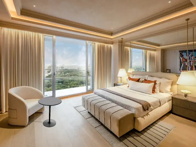 Lodha Massimo Baner — master bedroom with floor-to-ceiling hill views