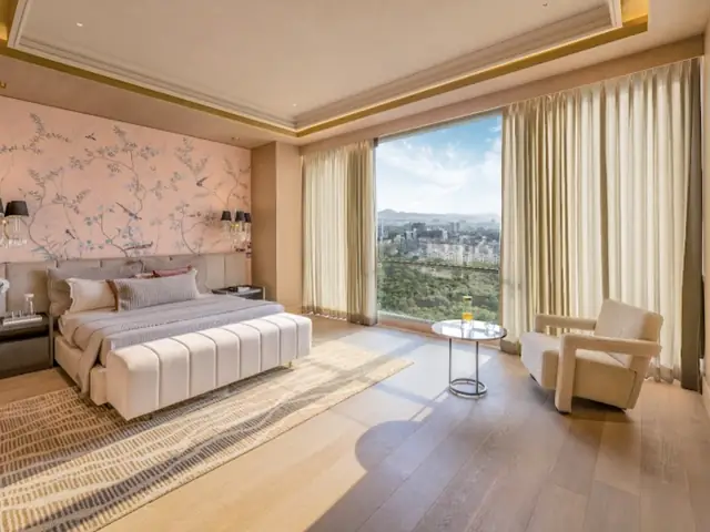 Lodha Massimo Baner — designer bedroom with artisan wall